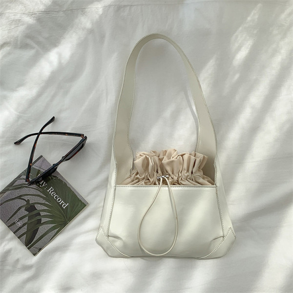 Drawstring crinkled patent-leather bag s56