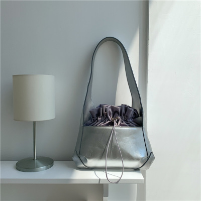 Drawstring crinkled patent-leather bag s56