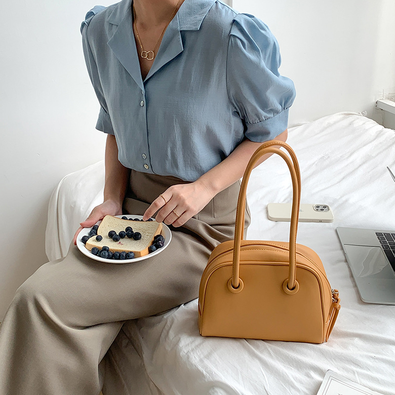 Semi-circular handbag 128